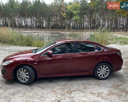 Красный Мазда 6, объемом двигателя 2 л и пробегом 156 тыс. км за 7999 $, фото 1 на Automoto.ua