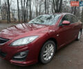 Красный Мазда 6, объемом двигателя 2 л и пробегом 146 тыс. км за 10500 $, фото 1 на Automoto.ua