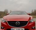 Красный Мазда 6, объемом двигателя 2.2 л и пробегом 249 тыс. км за 10500 $, фото 1 на Automoto.ua