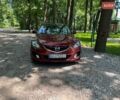 Красный Мазда 6, объемом двигателя 2 л и пробегом 103 тыс. км за 10250 $, фото 1 на Automoto.ua