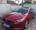 Красный Мазда 6, объемом двигателя 2.18 л и пробегом 390 тыс. км за 9700 $, фото 1 на Automoto.ua