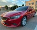 Красный Мазда 6, объемом двигателя 2.2 л и пробегом 165 тыс. км за 11900 $, фото 1 на Automoto.ua