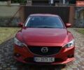 Красный Мазда 6, объемом двигателя 2 л и пробегом 188 тыс. км за 10699 $, фото 1 на Automoto.ua