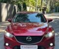 Красный Мазда 6, объемом двигателя 2 л и пробегом 172 тыс. км за 12500 $, фото 1 на Automoto.ua
