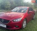 Красный Мазда 6, объемом двигателя 2 л и пробегом 110 тыс. км за 12500 $, фото 1 на Automoto.ua