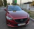 Красный Мазда 6, объемом двигателя 2 л и пробегом 153 тыс. км за 10700 $, фото 1 на Automoto.ua