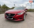 Красный Мазда 6, объемом двигателя 2.49 л и пробегом 165 тыс. км за 11000 $, фото 1 на Automoto.ua