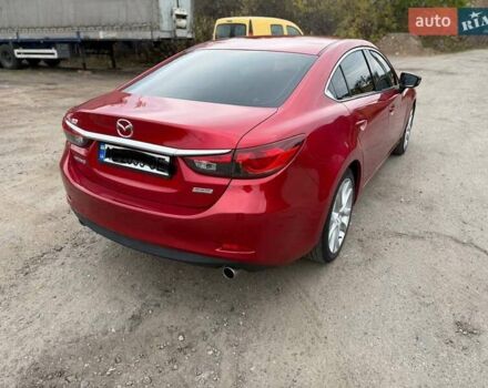 Красный Мазда 6, объемом двигателя 2.49 л и пробегом 165 тыс. км за 11000 $, фото 2 на Automoto.ua