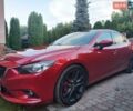 Красный Мазда 6, объемом двигателя 2.49 л и пробегом 252 тыс. км за 11000 $, фото 1 на Automoto.ua