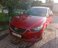 Красный Мазда 6, объемом двигателя 2.2 л и пробегом 324 тыс. км за 10000 $, фото 1 на Automoto.ua