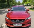 Красный Мазда 6, объемом двигателя 2 л и пробегом 113 тыс. км за 14900 $, фото 1 на Automoto.ua