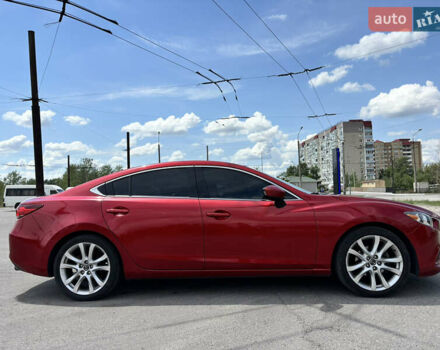 Красный Мазда 6, объемом двигателя 2.5 л и пробегом 205 тыс. км за 12300 $, фото 1 на Automoto.ua