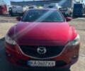 Красный Мазда 6, объемом двигателя 2 л и пробегом 161 тыс. км за 13000 $, фото 1 на Automoto.ua