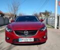 Красный Мазда 6, объемом двигателя 2.49 л и пробегом 233 тыс. км за 9700 $, фото 1 на Automoto.ua