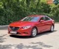 Красный Мазда 6, объемом двигателя 2 л и пробегом 113 тыс. км за 14900 $, фото 1 на Automoto.ua