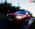 Красный Мазда 6, объемом двигателя 2.49 л и пробегом 123 тыс. км за 10990 $, фото 1 на Automoto.ua