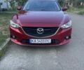 Красный Мазда 6, объемом двигателя 2 л и пробегом 220 тыс. км за 12200 $, фото 1 на Automoto.ua