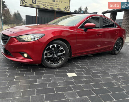 Красный Мазда 6, объемом двигателя 2.49 л и пробегом 175 тыс. км за 12590 $, фото 1 на Automoto.ua