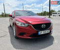 Красный Мазда 6, объемом двигателя 2.5 л и пробегом 205 тыс. км за 12300 $, фото 1 на Automoto.ua