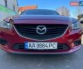 Красный Мазда 6, объемом двигателя 2.49 л и пробегом 168 тыс. км за 14698 $, фото 1 на Automoto.ua