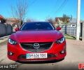 Красный Мазда 6, объемом двигателя 2.5 л и пробегом 233 тыс. км за 9750 $, фото 1 на Automoto.ua