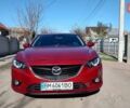 Красный Мазда 6, объемом двигателя 2.49 л и пробегом 233 тыс. км за 10150 $, фото 1 на Automoto.ua