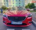 Красный Мазда 6, объемом двигателя 2.5 л и пробегом 285 тыс. км за 12000 $, фото 1 на Automoto.ua