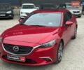 Красный Мазда 6, объемом двигателя 2.5 л и пробегом 270 тыс. км за 12640 $, фото 1 на Automoto.ua