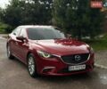 Красный Мазда 6, объемом двигателя 2.19 л и пробегом 152 тыс. км за 12999 $, фото 1 на Automoto.ua