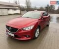 Красный Мазда 6, объемом двигателя 2 л и пробегом 164 тыс. км за 12700 $, фото 1 на Automoto.ua