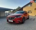 Красный Мазда 6, объемом двигателя 2.4 л и пробегом 278 тыс. км за 12000 $, фото 1 на Automoto.ua