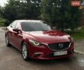 Красный Мазда 6, объемом двигателя 2.19 л и пробегом 152 тыс. км за 12999 $, фото 1 на Automoto.ua