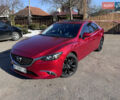 Красный Мазда 6, объемом двигателя 2.49 л и пробегом 149 тыс. км за 12499 $, фото 1 на Automoto.ua
