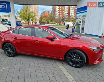 Красный Мазда 6, объемом двигателя 2.49 л и пробегом 320 тыс. км за 12000 $, фото 1 на Automoto.ua