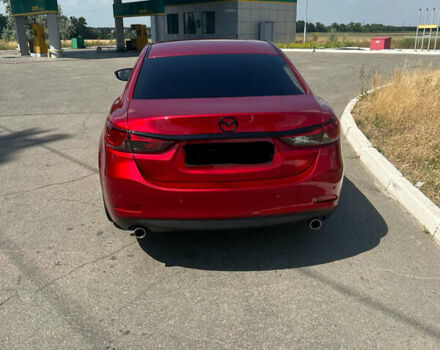 Красный Мазда 6, объемом двигателя 2 л и пробегом 116 тыс. км за 15990 $, фото 2 на Automoto.ua