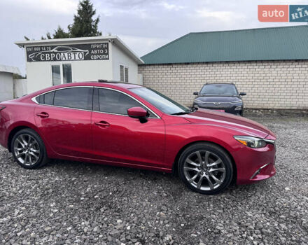 Красный Мазда 6, объемом двигателя 2.5 л и пробегом 106 тыс. км за 15500 $, фото 1 на Automoto.ua