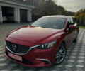 Красный Мазда 6, объемом двигателя 2.5 л и пробегом 107 тыс. км за 15500 $, фото 1 на Automoto.ua
