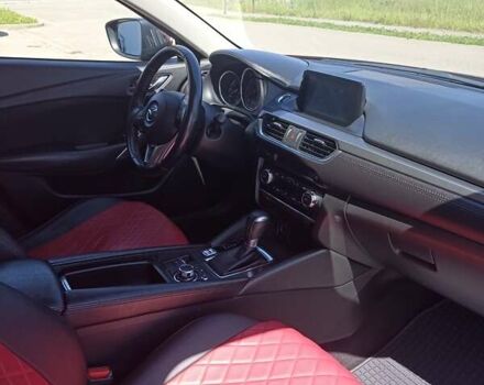 Красный Мазда 6, объемом двигателя 2 л и пробегом 70 тыс. км за 14990 $, фото 2 на Automoto.ua