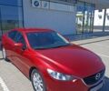 Красный Мазда 6, объемом двигателя 2 л и пробегом 70 тыс. км за 14990 $, фото 1 на Automoto.ua