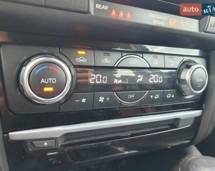 Красный Мазда 6, объемом двигателя 2 л и пробегом 76 тыс. км за 13000 $, фото 17 на Automoto.ua