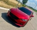 Красный Мазда 6, объемом двигателя 2 л и пробегом 116 тыс. км за 15800 $, фото 1 на Automoto.ua
