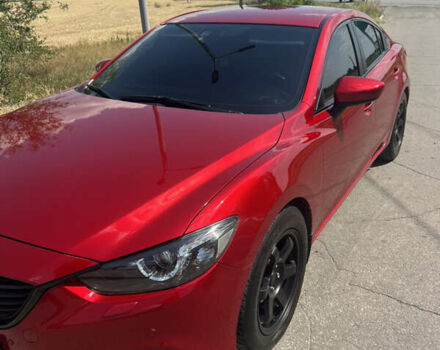 Красный Мазда 6, объемом двигателя 2 л и пробегом 116 тыс. км за 15990 $, фото 1 на Automoto.ua