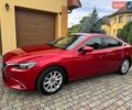 Красный Мазда 6, объемом двигателя 2.2 л и пробегом 63 тыс. км за 16000 $, фото 1 на Automoto.ua