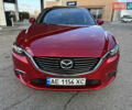 Красный Мазда 6, объемом двигателя 2.49 л и пробегом 145 тыс. км за 13650 $, фото 1 на Automoto.ua