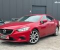Красный Мазда 6, объемом двигателя 2.5 л и пробегом 141 тыс. км за 12240 $, фото 1 на Automoto.ua