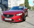 Красный Мазда 6, объемом двигателя 2.5 л и пробегом 150 тыс. км за 13900 $, фото 1 на Automoto.ua