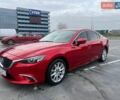 Красный Мазда 6, объемом двигателя 2.19 л и пробегом 94 тыс. км за 16100 $, фото 1 на Automoto.ua