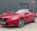 Красный Мазда 6, объемом двигателя 2.5 л и пробегом 141 тыс. км за 12240 $, фото 1 на Automoto.ua