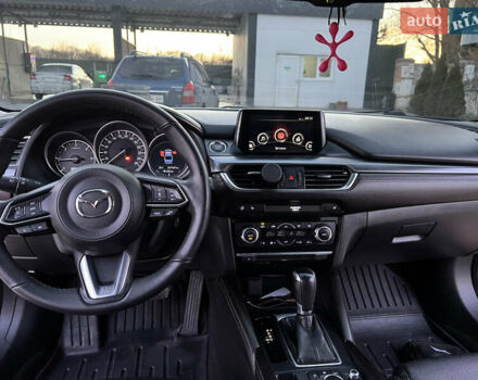 Красный Мазда 6, объемом двигателя 2.19 л и пробегом 237 тыс. км за 13900 $, фото 11 на Automoto.ua