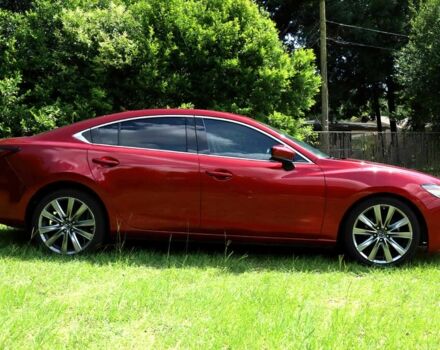 Красный Мазда 6, объемом двигателя 2.5 л и пробегом 33 тыс. км за 5400 $, фото 7 на Automoto.ua